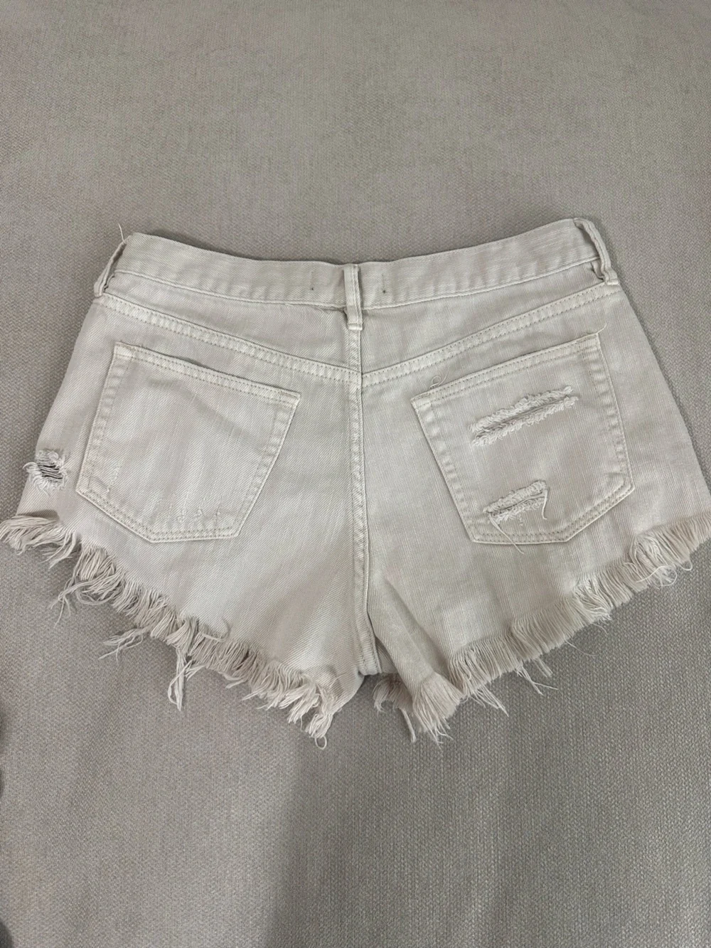 Free People Cream Distressed Denim Cutoff Shorts